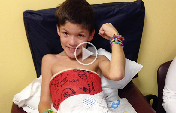 Dylan fist pumps before getting his full-body cast removed!